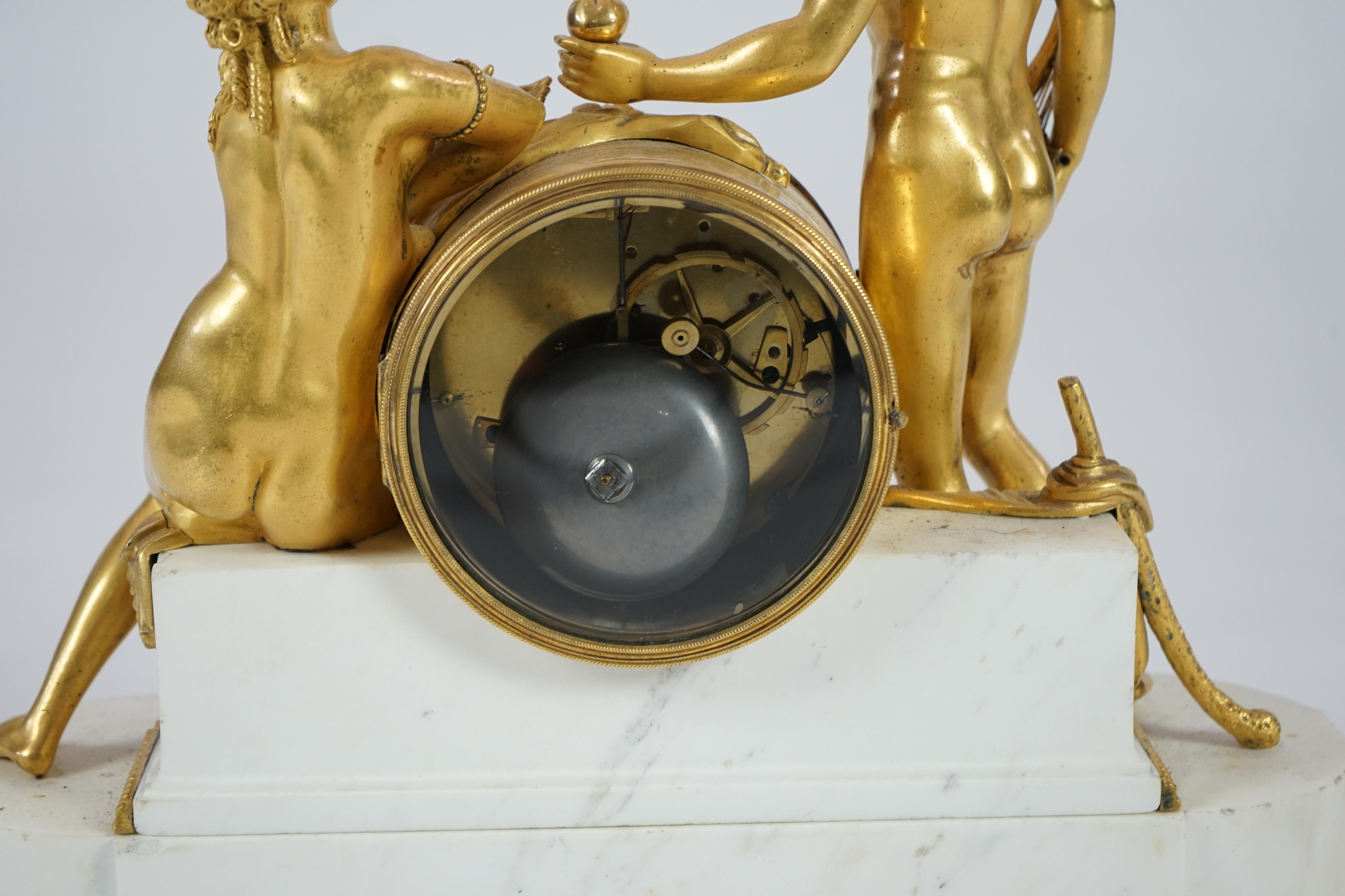 J. Petite of Paris. A 19th century French ormolu and white marble eight day mantel clock